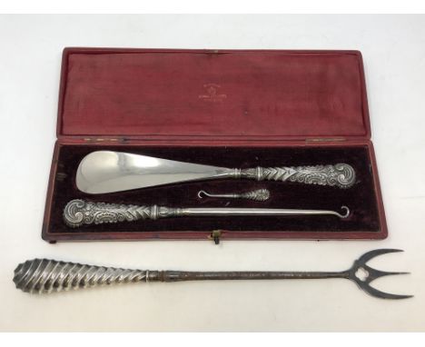 A Victorian cased silver mounted shoehorn and button hooks, together with a silver mounted toasting fork 