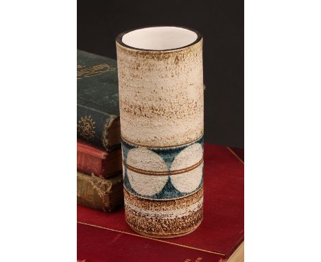 A Troika cylindrical vase, by Linda Hazel, monogrammed, applied with a band of divided roundels,14cm, painted mark, c.1970