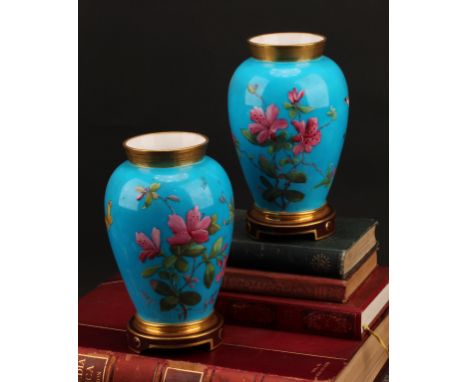 A pair of Mintons Aesthetic Movement chinoiserie ovoid vases, enamelled with blossom and insects on a turquoise blue ground, 