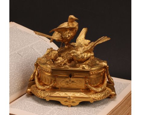 A 19th century French gilt bronze jewellery box, the hinged cover sculptured with birds by a rocky outcrop and nest, one feed