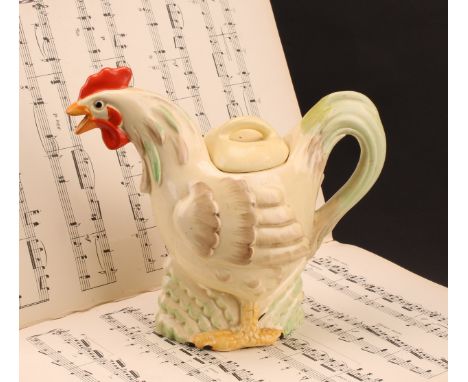 A Clarice Cliff novelty teapot and cover, modelled as a cockerel, painted in muted tones, 19.5cm high, Wilkinson Ltd., Englan