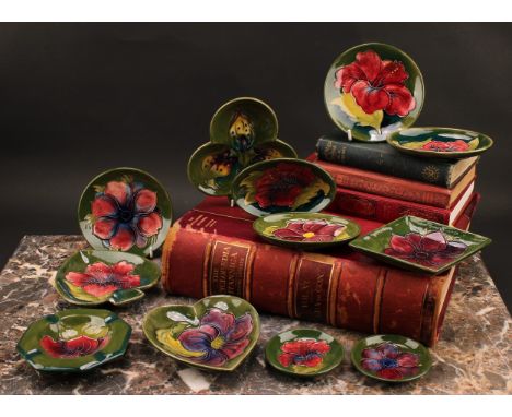 A Moorcroft Clematis pattern heart shaped trinket dish, 13cm long, impressed mark; a Moorcroft Anemone pattern circular trink