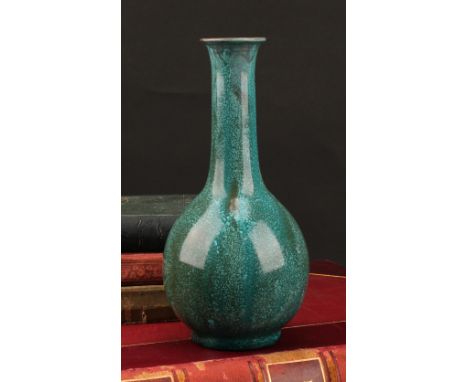 A Pilkington's Royal Lancastrian bottle vase, drip glazed in mottled turquoise green shades, flared everted neck, 19cm, impre