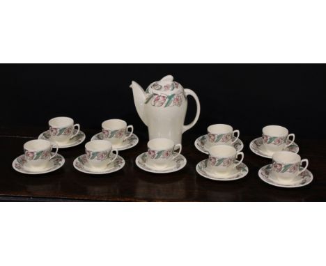 A Susie Cooper Endon 1574 pattern Kestral shape coffee service for nine, comprising coffee pot and cover, cans, and saucers, 