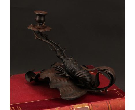 An Aesthetic Movement period wrought iron chamber stick, incorporating a Japanese Meiji period dark patinated bronze crayfish