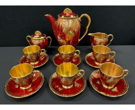 A Carlton Ware 'Rouge Royale' Royal Heron &amp; Wisteria pattern coffee set,  in coloured enamels and gilt on a red ground, c