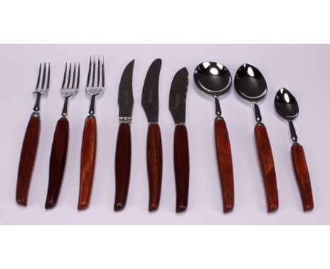 An extensive Glosswood table service comprising 6 steak forks, 6 steak knives, 12 table forks, 12 table knives, 30 tea spoons