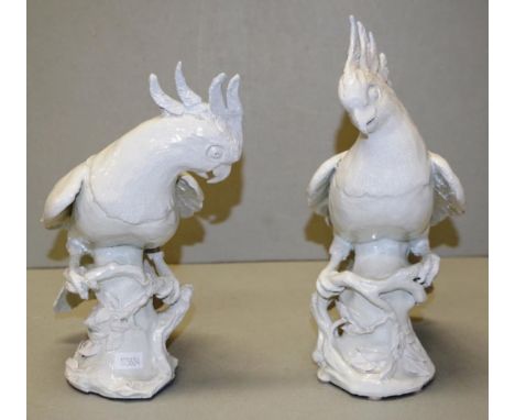Pair ceramic cockatoo figures each perched on a branch, monogrammed mark G.A.J. to base, (possibly Italian). (Height 25cm app