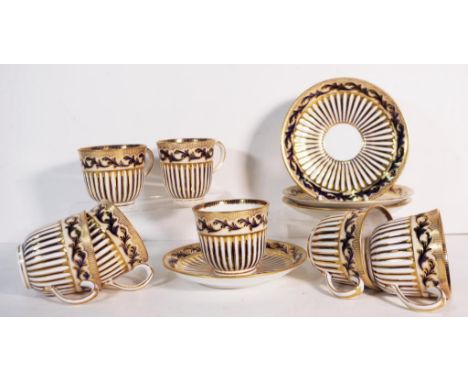 Victorian Davenport part tea service marked to back, cobalt blue and gilt, consisting of six teacups, four saucers, and one c
