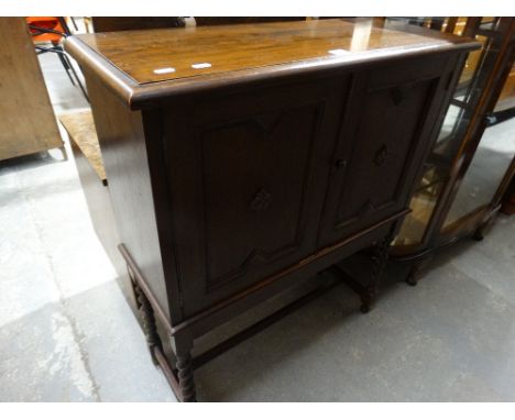     A Polished Oak Two Door Side Cabinet                                            