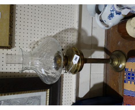     A Circular Based Brass Column Oil Lamp                                          