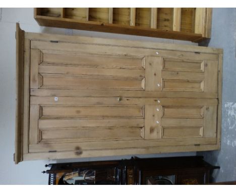     A Tall Stripped Pine Two Door Housekeepers Cupboard                             