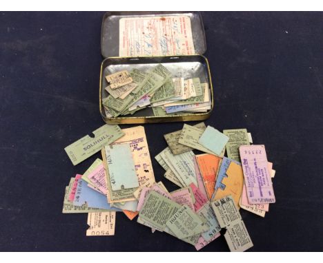 Collection of vintage train tickets in vintage tin.