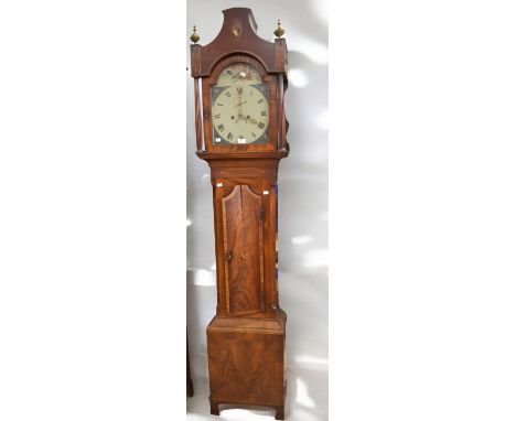 A George III 8 day longcase clock with arched dial, Roman numerals, painted face with floral detail, second and date dials, m