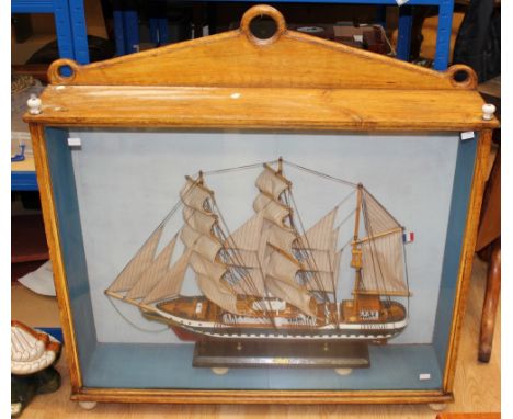 A large early 20th Century hand crafted ship "Belem" within a pine glazed fronted display case with ceramic bun feet supports