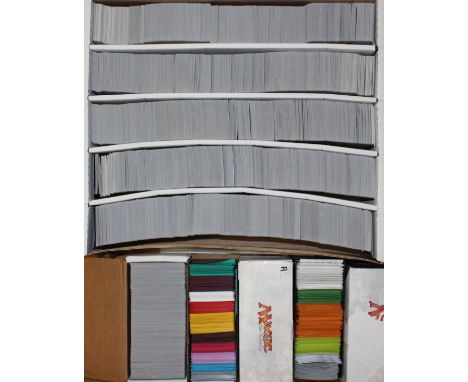Magic the Gathering: A large collection of assorted common Magic the Gathering cards within a sorter's box. Mixed condition b