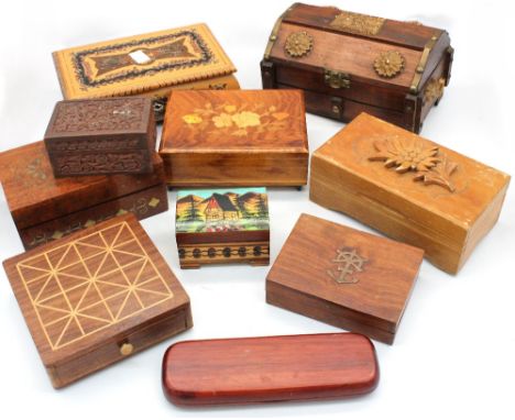 A collection of treen trinket boxes and musical trinket boxes.