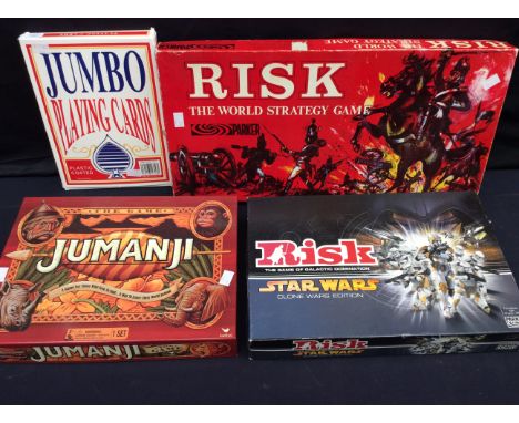 A collection of vintage and modern boxed weekend games i.e Risk, Jumanji, Star wars Risk and long with a jumbo pack of playin