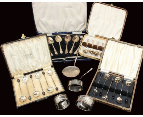 A collection of silver items to include: a cased set of George V silver coffee bean spoons, of Deco style design to bowls, ha