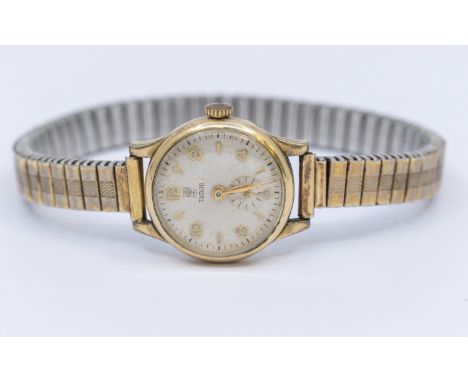 A ladies gold plated Tudor wristwatch, comprising a round signed silvered dial with applied arrow and Arabic markers, subsidi