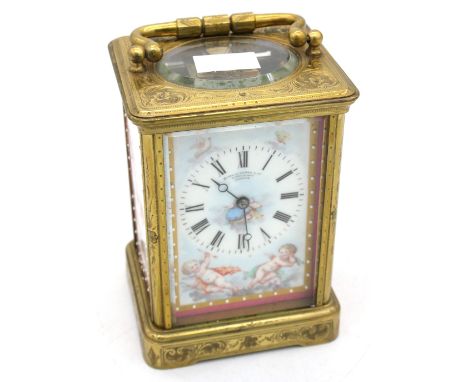 A mid to late 19th Century French brass carriage clock, 8 day with Roman numerals, French porcelain plaques to and face and s