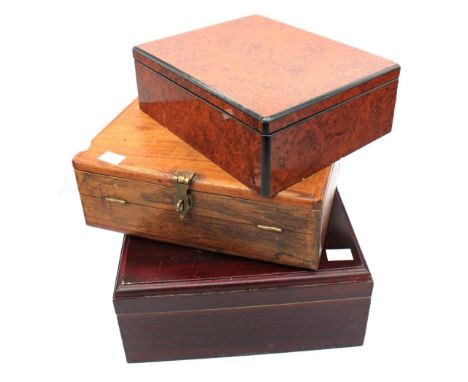 A walnut vanity trinket box, oak writing box along with a mahogany box with golfing motif.