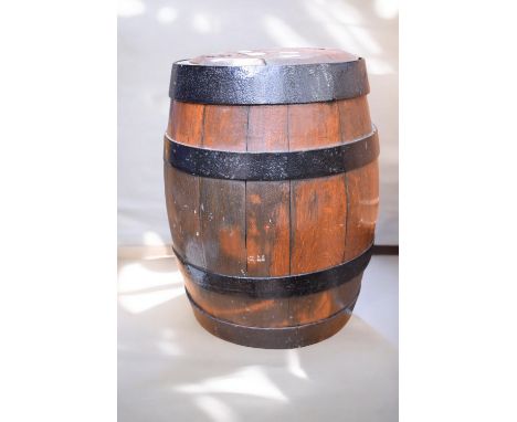 A vintage small oak maybe sherry barrel, with cast iron strapping.