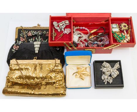 A collection of vintage costume jewellery to include a diamond set 9ct gold set pin, along with brooches including Trifari gi