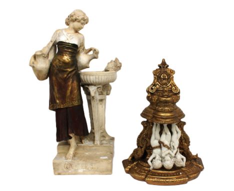 Art nouveau plaster figure of a lady carrying water along with a decorative cherub wall bracket stand.