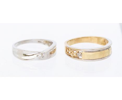 A diamond and 18ct white gold cross over band set to the centre with a round brilliant cut diamond approx 0.10ct, band width 