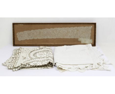 A beige and cream lace table cloth, medium size with floret design, a cotton scalloped edged table cloth with a cut away corn