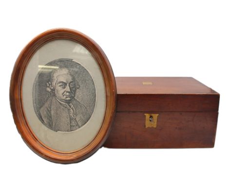 A late Victorian mahogany writing box along with an 18th Century etching of a gentleman in an oval frame.