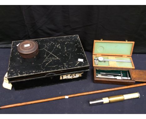 A large mid 20th Century metal cash tin, Pression boxed tools, early 20th measuring stick, treen box etc.
