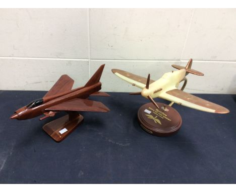 Supermarine battery operated desk lamp along with a mahogany figure jet on stand.
