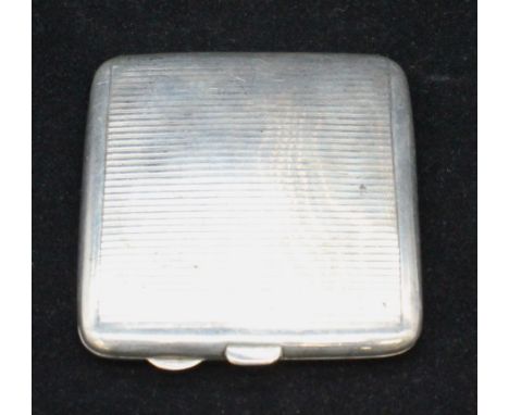A George VI silver cigarette case, of curved square form with banded engine turned design, gilt interior, hallmarked by Walke