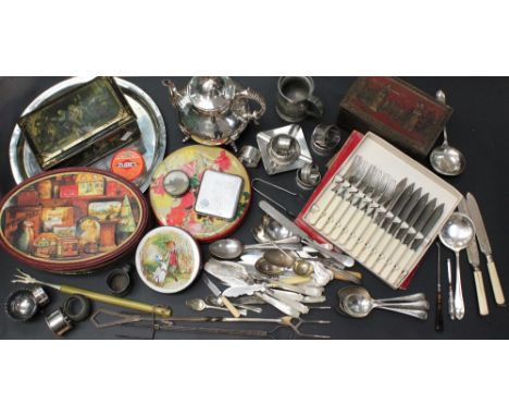 A collection of silver plate, pewter, flat wares, mother of pearl flat wares, cigarette case, tray with condiments, napkin ri