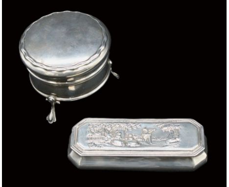 A late Victorian silver long octagonal snuff box, having embossed figures and countryside designed hinged cover, with gilt in