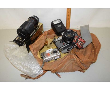 Yashica SX-D camera together with further digital camera and lens