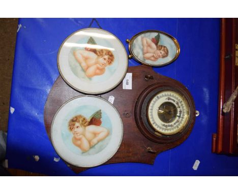 Small barometer and frameless pictures of cherubs