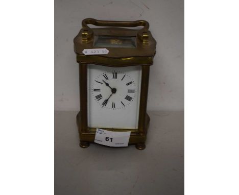 French carriage clock in brass serpentine front case