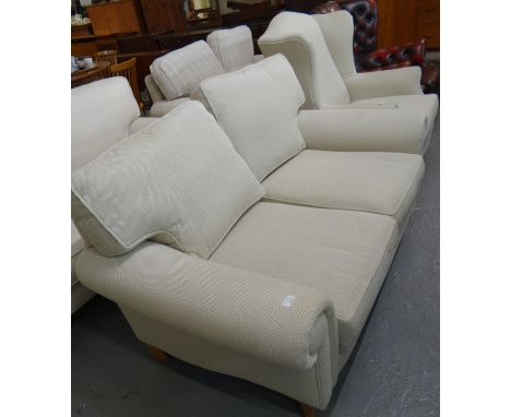 Modern Laura Ashley beige/cream two seater sofa with shaped arms together with a similar wing chair.  (2)  (B.P. 21% + VAT) 