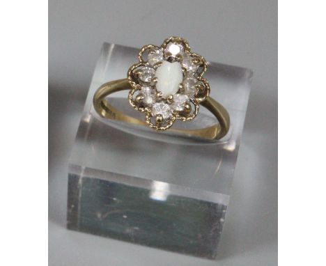 9ct gold opal flower head ring, 3.1 g approx.  Ring size P. (B.P. 21% + VAT) 