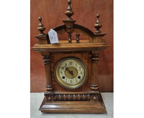 Early 20th Century walnut probably German architectural two train mantel clock. (B.P. 21% + VAT) 