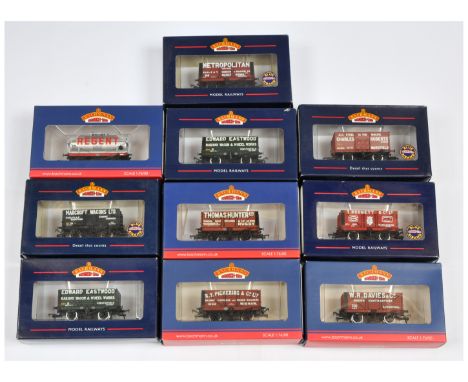 Bachmann group of Bachmann Collectors Club Wagons to include 37-2013K1 14 ton Tank Wagon "Regent", 37-150K 8-plank Wagon "Met
