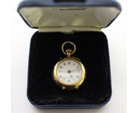 A YELLOW METAL CASED FOB WATCH with white enamel dial and blue painted numerals, engraved to the interior of the case 'Asprey