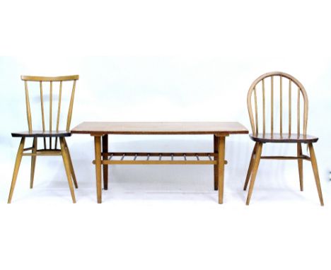 TWO ERCOL ELM SPINDLE BACK CHAIRS and a Ercol style centre table 108cm wide (3)