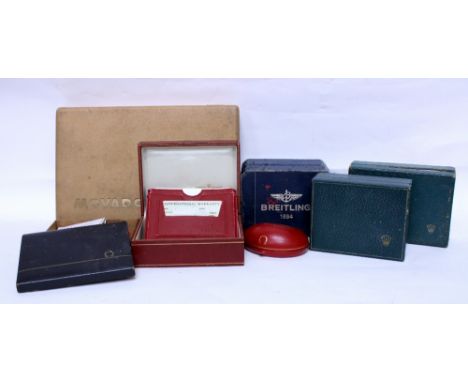 A COLLECTION OF THREE VINTAGE ROLEX WRIST WATCH BOXES together with two Omega wrist watch boxes, a Breitling wrist watch box 