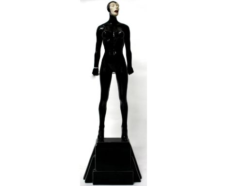***** PATTERSON BLACK CERAMIC FIGURE OF A DOMINATRIX   signed indistinctly to the reverse, 55cm high approx A/F 