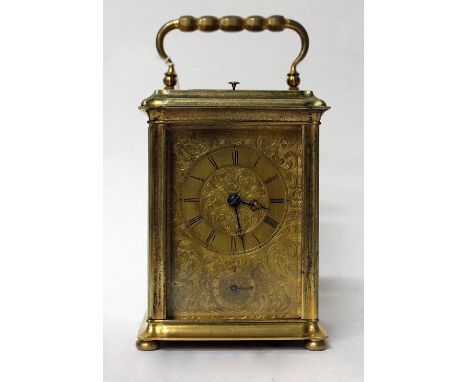 A LATE 19TH CENTURY FRENCH GILT CASED REPEATER CARRIAGE CLOCK  with engraved front plate and alarm striking a bell, indistinc