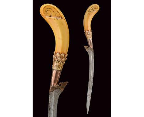 dating: 19th Century provenance: Sumatra Curved, hollow, single-edged blade, with a fuller on two-third of the blade, lined w